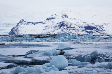 Iceland. Landscape of black beaches with icebergs