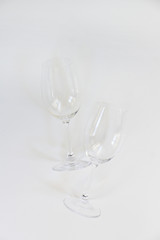 empty two wine glasses on white vertical background