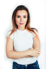 young pretty teenage hipster girl posing emotional happy smiling on white background, lifestyle people concept