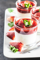 Italian dessert panna cotta with strawberries