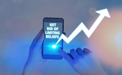 Writing note showing Get Rid Of Limiting Beliefs. Business concept for remove negative beliefs and think positively