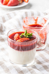 Italian dessert panna cotta with strawberries