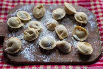 dumplings on a wooden board