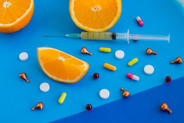 mesotherapy injection.Vitamin C. Orange in a Cut and Syringe ,Vitamins Against Medications.anti...