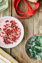 Composition of Flatley with spices. Peppers on a plate in a restaurant.