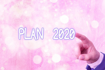 Writing note showing Plan 2020. Business concept for detailed proposal for doing or achieving...