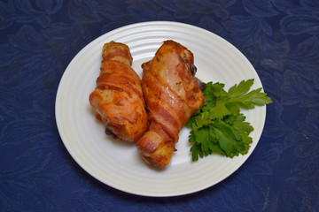 chicken legs wrapped in bacon