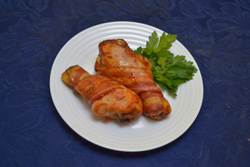 chicken legs wrapped in bacon