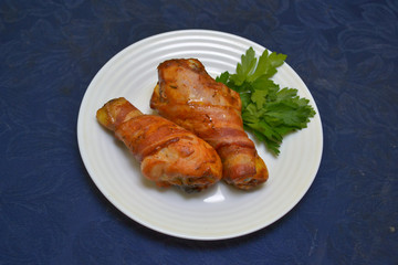 chicken legs wrapped in bacon