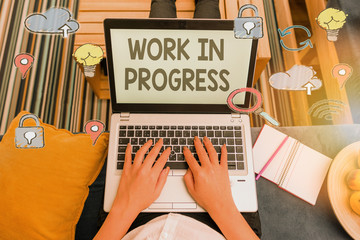 Writing note showing Work In Progress. Business concept for unfinished project that still added to...