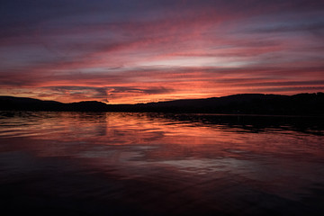 sunset on coast of lake