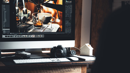 Home office desk,Computers and cameras on the desk