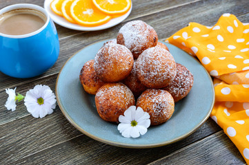 Curd balls fries on breakfast. Freshly made donuts with powdered sugar.  Dessert from the cottage cheese