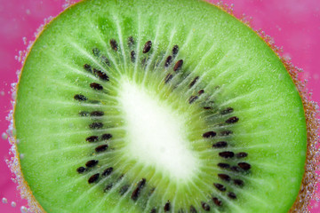 close-up kiwi fruit, background in water, under water. background, texture