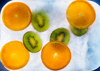 kiwi and orange in ice