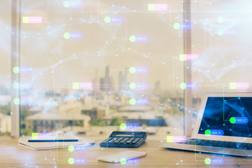 Double exposure of desktop computer and technology theme hologram. Concept of software development.
