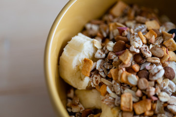 Breakfast bowl. Yogurt, cereals, berries and banana