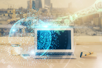 Double exposure of desktop computer and technology theme hologram. Concept of software development.