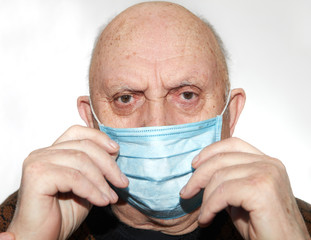 Elderly man in a medical mask