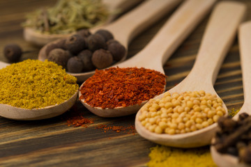 Spices over wooden background. close up