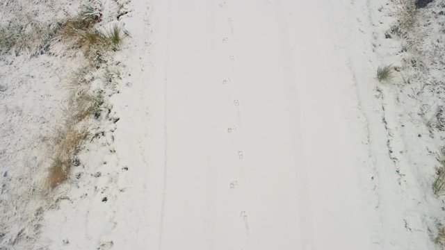 Footprints in snow from drone