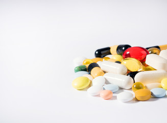 Medications on white background. Concept of Health Care. Copy space.