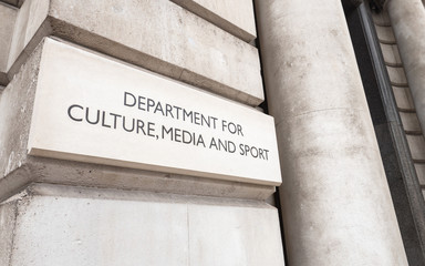 The Department for Culture, Media and Sport. Entrance sign to the UK government building for the DCMS on London's Whitehall, England. - 333168181