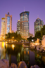Fototapeta premium Office buildings at Lujiazui financial district from Central Greenfield park in Pudong, Shanghai, China,