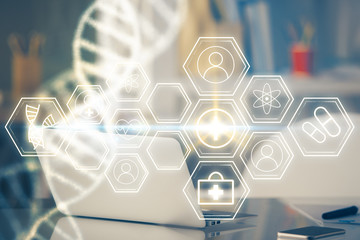 Desktop computer background and DNA drawing. Double exposure. Science concept.