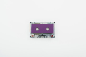 Obraz premium top view of purple cassette isolated on white