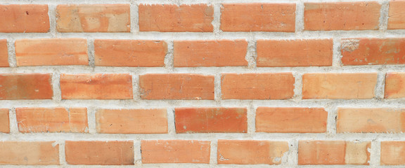 The texture and pattern of red bricks for background.