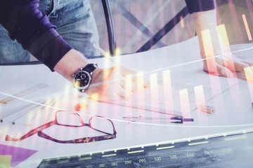 Multi exposure of man standing and planing investment with stock market forex chart.