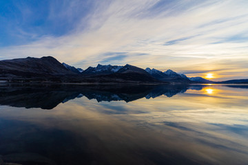 November in northern Norway. The sun rising just above the horizon at 12am