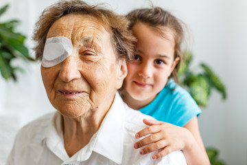 elderly woman with one eye surgery