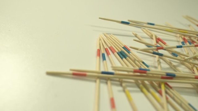 Splints of the mikado game on a white shelf