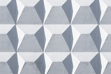 Natural natural geometric texture of concrete slab in macro shot in sunny weather with repeating elements