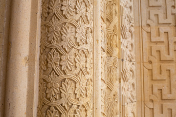Closeup view photography of beautiful decorative elements of wall of building.