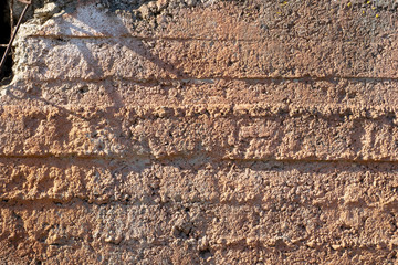 Natural aged cement slab texture in macro shot