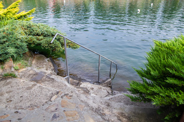 stone stairs into a natural mountain pool