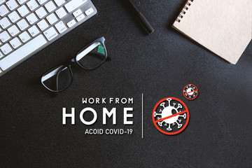 stop covid-19 concept. work from home. top view of office desk workspace with pen and keyboard on white table background