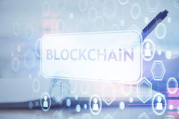 Cryptocurrency hologram over hands taking notes background. Concept of blockchain. Multi exposure