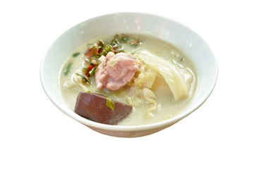 spicy boiled chicken meat and blood with slice cabbage in coconut milk soup on bowl