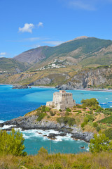 Fototapeta premium A medieval tower on the coast of Calabria, a region of southern Italy