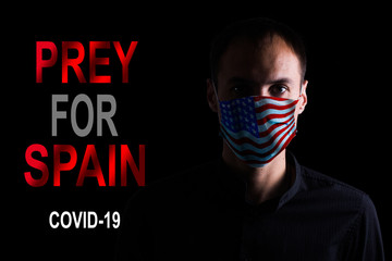 Man with mask for virus protection with text Pray for the World corona virus covid-19