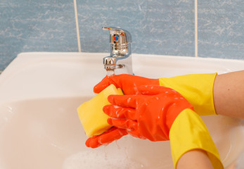 cleaning, disinfection, hands in rubber gloves