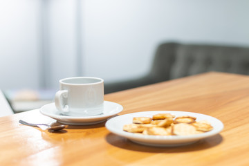 Coffee cup and seet things for breakfast