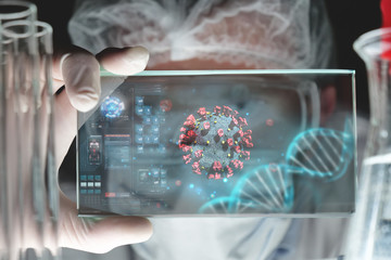 Portrait of futuristic researcher is using futuristic screen with augmented reality coronavirus...