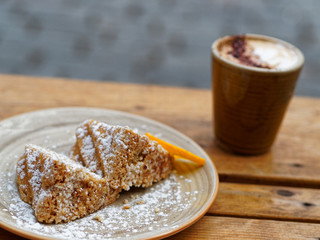 Coffee and cardamon cake with slice of orange