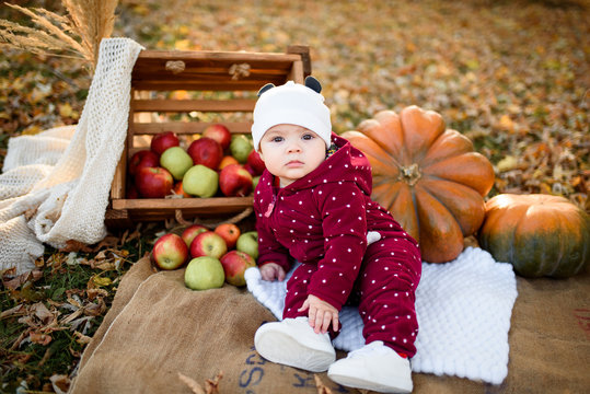 happy baby girl in the autumn park
