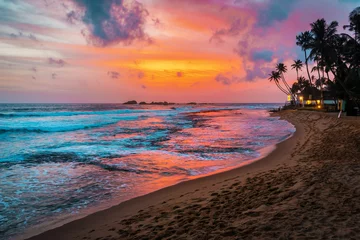 Poster prachtige tropische zonsondergang en strand © Volodymyr Shevchuk